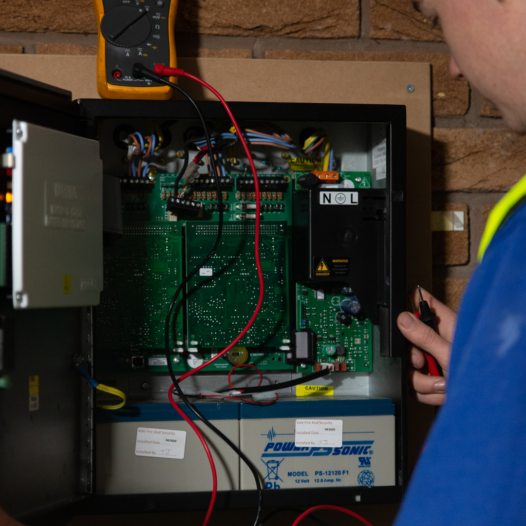 Engineer maintaining system